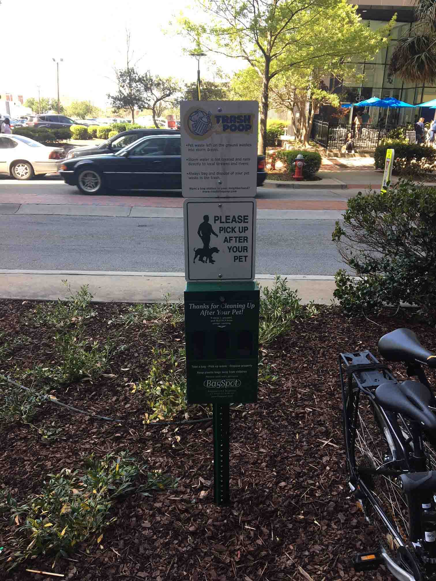 Educational signage on one of the City of Columbia's pet-waste bag stations